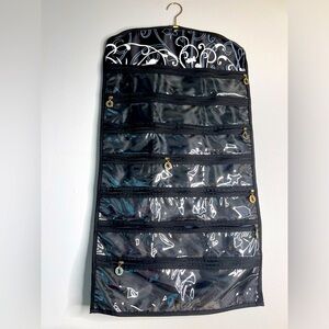 Jewelry and accessories organizer with 40 individual pockets.